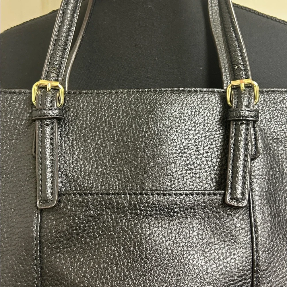 Anne Klein Black leather Tote with size pocket and adjustable straps. 13”x9 1/2”